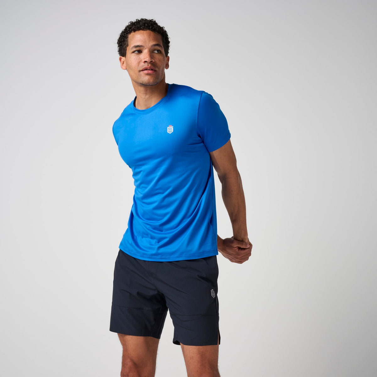 Greatness Wins Men's Core Tech Tee | Sonic Blue