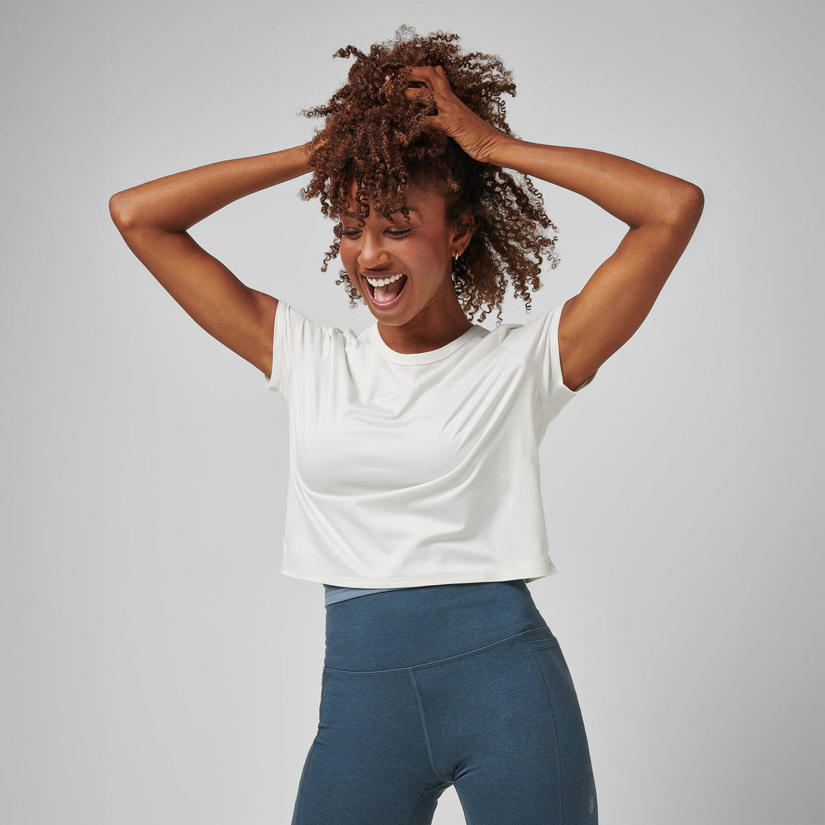 Greatness Wins Women's Core Tech Crop Tee | Soft White