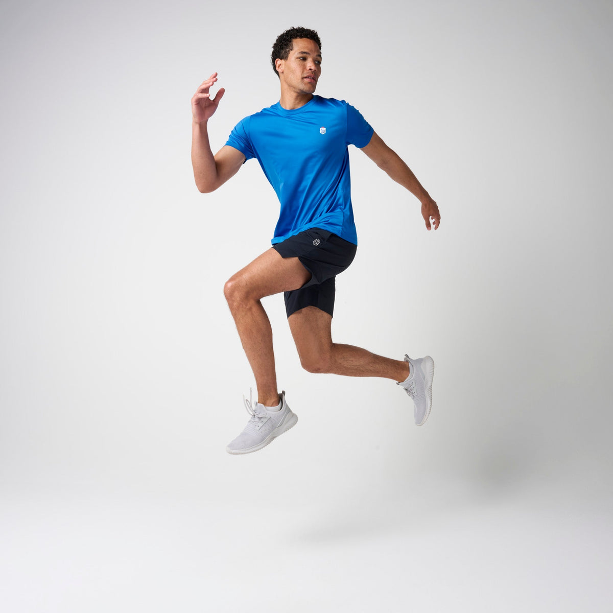 Greatness Wins Men's Core Tech Tee | Sonic Blue