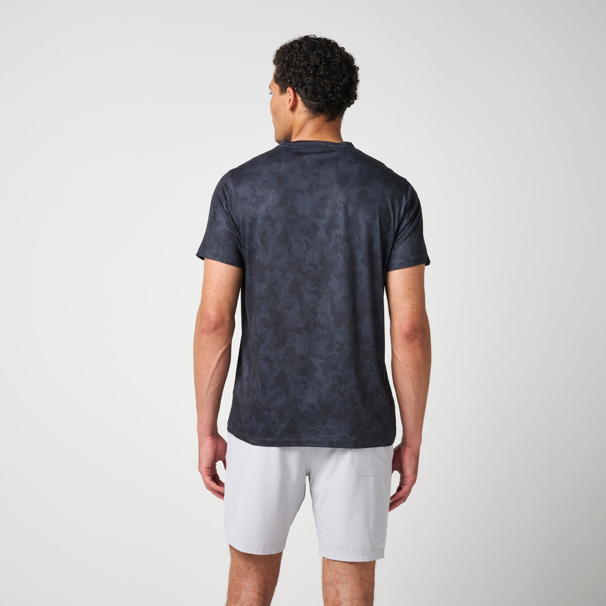 Greatness Wins Men's Core Tech Tee | Black Camo