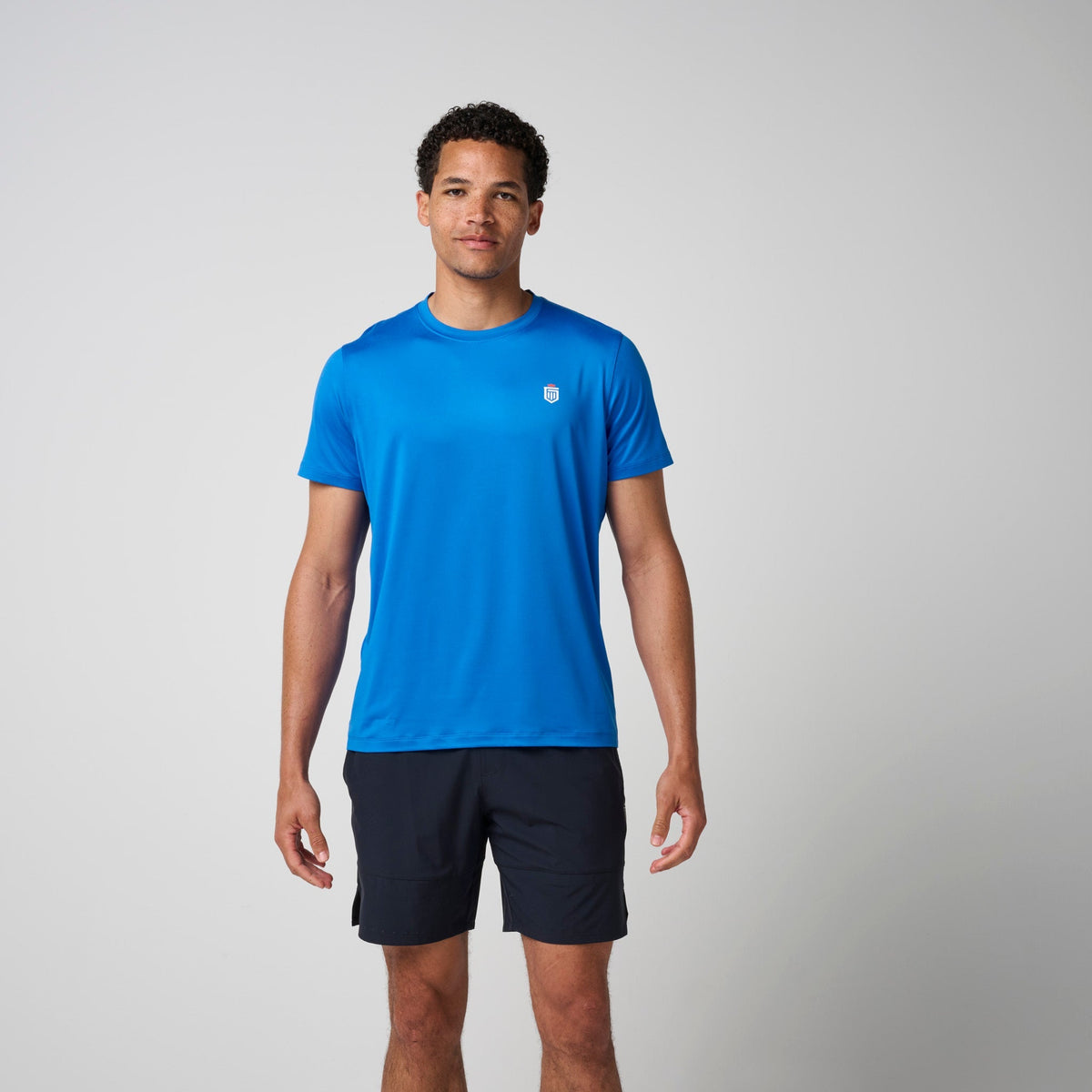 Greatness Wins Men's Core Tech Tee | Sonic Blue
