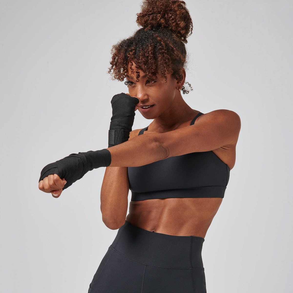 Greatness Wins Women's High Output Sports Bra | Black