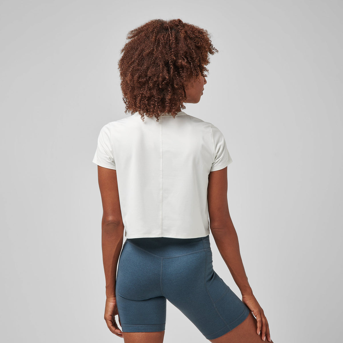 Greatness Wins Women's Core Tech Crop Tee | Soft White